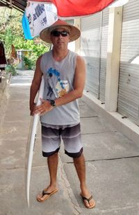 Portrait of mature man wearing sunglasses standing outdoors