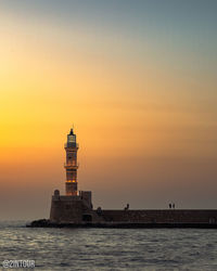 Romantic sunset light on chania venetian harbour, crete