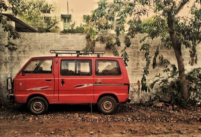 Vintage car against trees