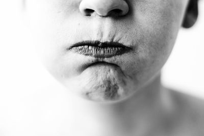 Close-up of person making face