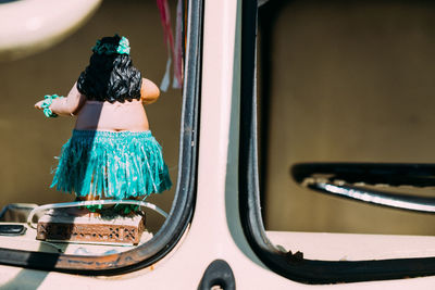 Rear view of woman with umbrella