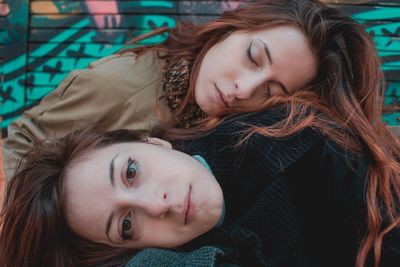 Portrait of beautiful females resting outdoors