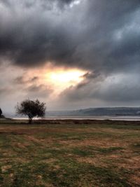 Scenic view of sea against cloudy sky