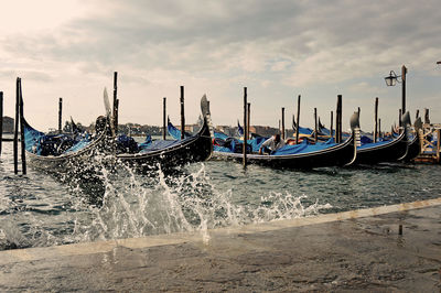 View of boats moored in sea