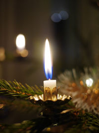 Close-up of illuminated candle