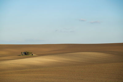 Scenic view of desert against sky