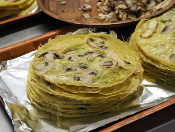 Close up on vietnamese fried pancake made of rice flour, water, and turmeric powder