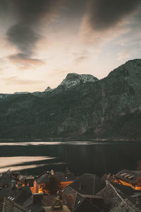 Scenic view of lake against sky during sunset