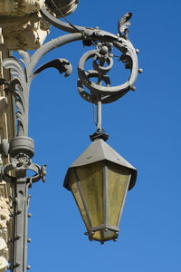 Low angle view of street light against clear sky