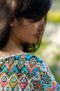 Close-up of young woman with multi colored hair