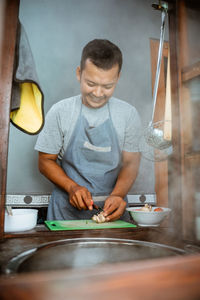 Portrait of man working at home