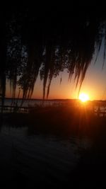 Scenic view of sunset over river