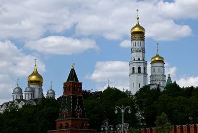 View of buildings against cloudy sky