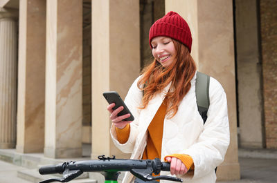 Young woman using mobile phone