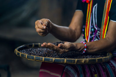 Close-up of woman preparing food