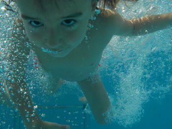 Cute boy in water