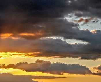 Scenic view of dramatic sky during sunset