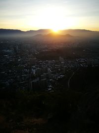 High angle view of townscape against sky during sunset