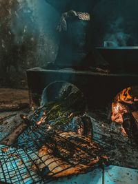 High angle view of fire on barbecue grill