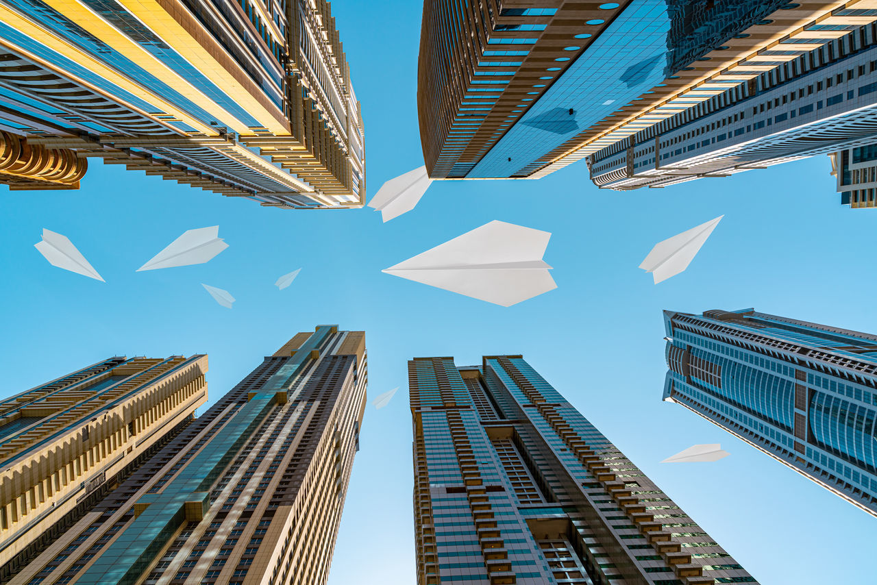 LOW ANGLE VIEW OF BUILDINGS AGAINST SKY