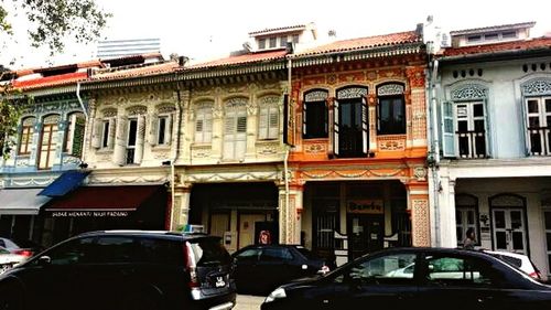 Cars parked in front of building