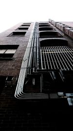 Low angle view of staircase against clear sky