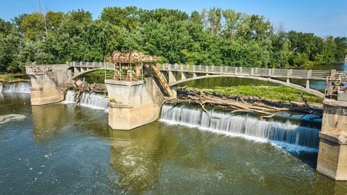 Bridge over river against sky