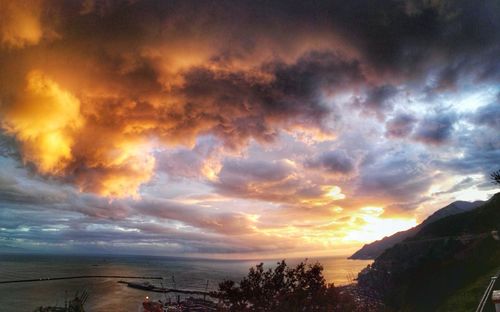 Scenic view of dramatic sky over sea