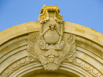 Low angle view of statue against clear sky