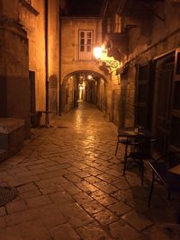 Illuminated road at night