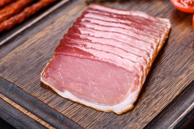 Close-up of meat on cutting board