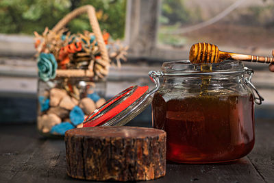 Close-up of glass jar on table