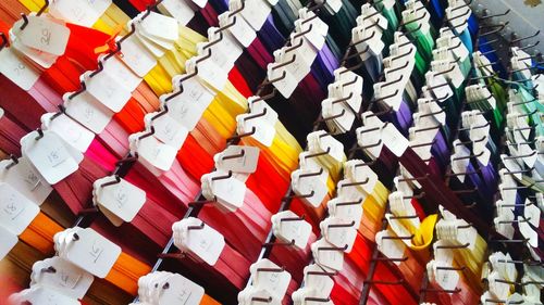 High angle view of multi colored pencils in row