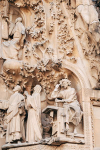 Low angle view of statues on building