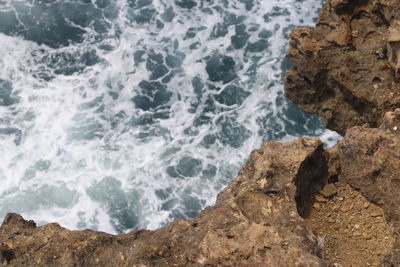 High angle view of rocks on beach