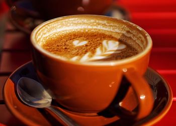 Close-up of cappuccino on table