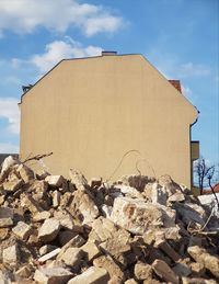 View of built structure on beach against sky