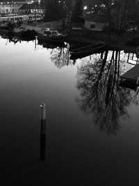 High angle view of buildings by lake