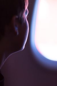 Close-up of human eye against black background