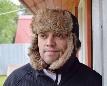 Close-up of man wearing headwear