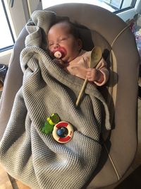 Cute baby girl in car