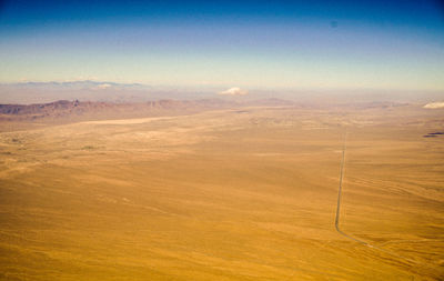 Scenic view of desert against sky