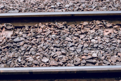 High angle view of pigeons on railroad track