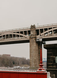Low angle view of bridge against clear sky