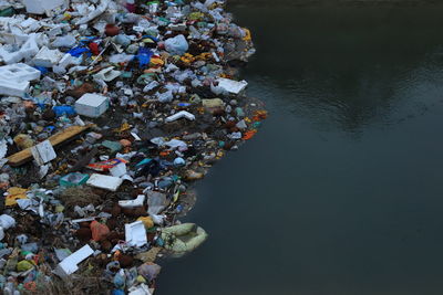High angle view of garbage on riverbank