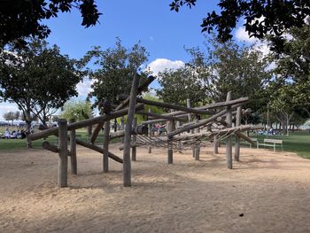 Trees in park against sky