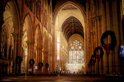 Group of people in illuminated building