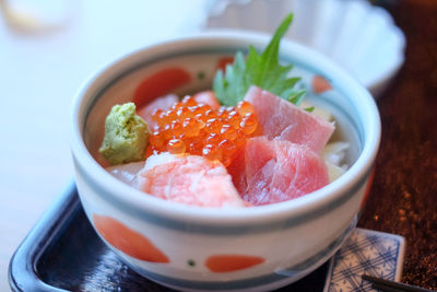 Close-up of fish served in bowl on table