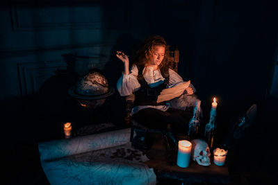 Friends sitting in the dark