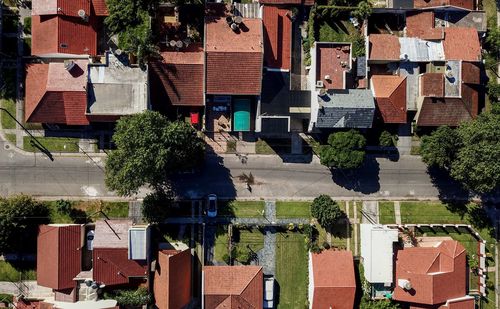 High angle view of road amidst residential buildings in city